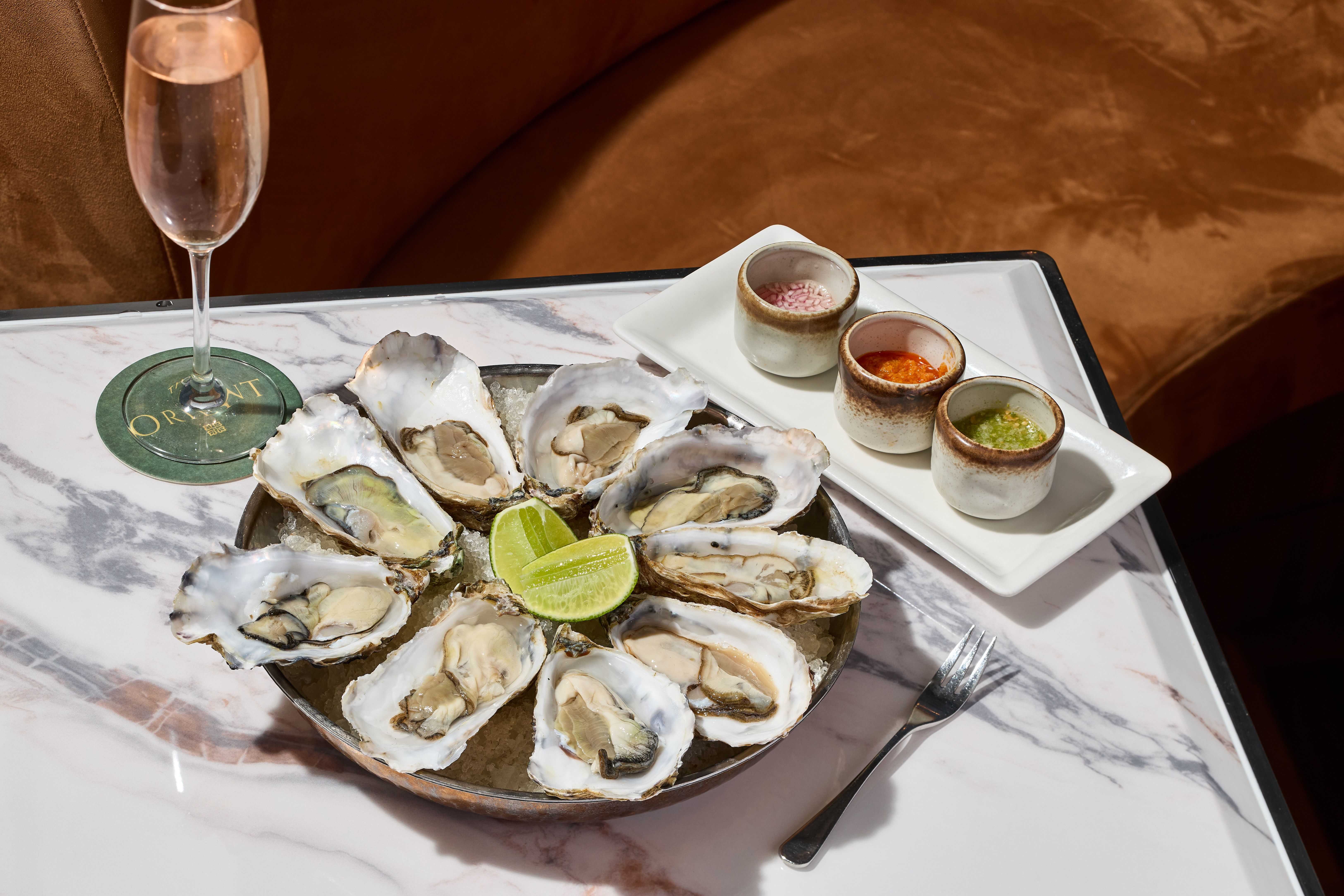 https://sandshospitality.s3.ap-southeast-1.amazonaws.com/The_Orient_Steakhouse_Raw_Bar_Oysters_champagne_mignonette_kaffir_lime_sambal_green_nam_jim_1_9500638b03.jpg